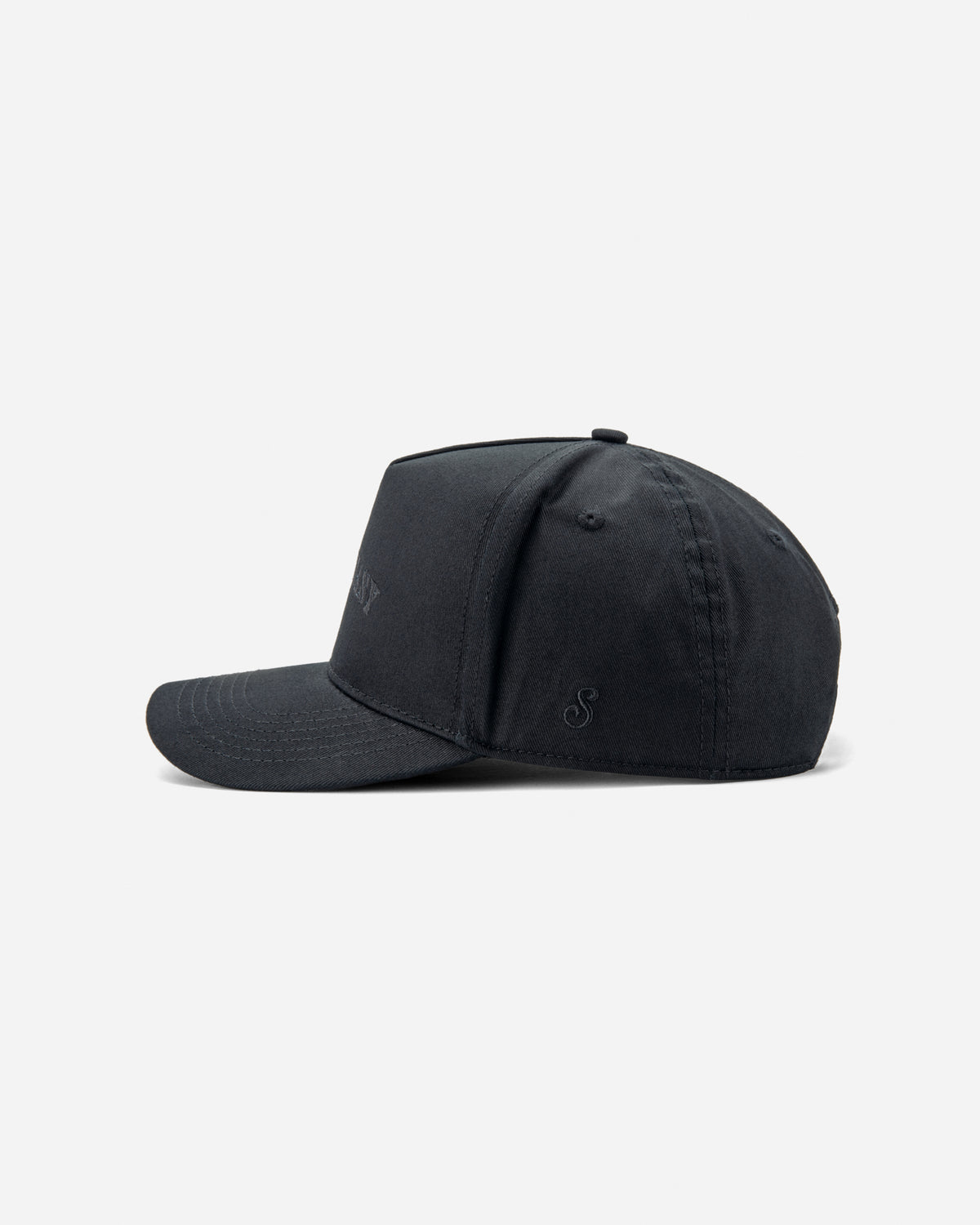 A black structured baseball cap shown from a side profile view against a plain white background, featuring a tonal embroidered 'alexand' logo on the side.
