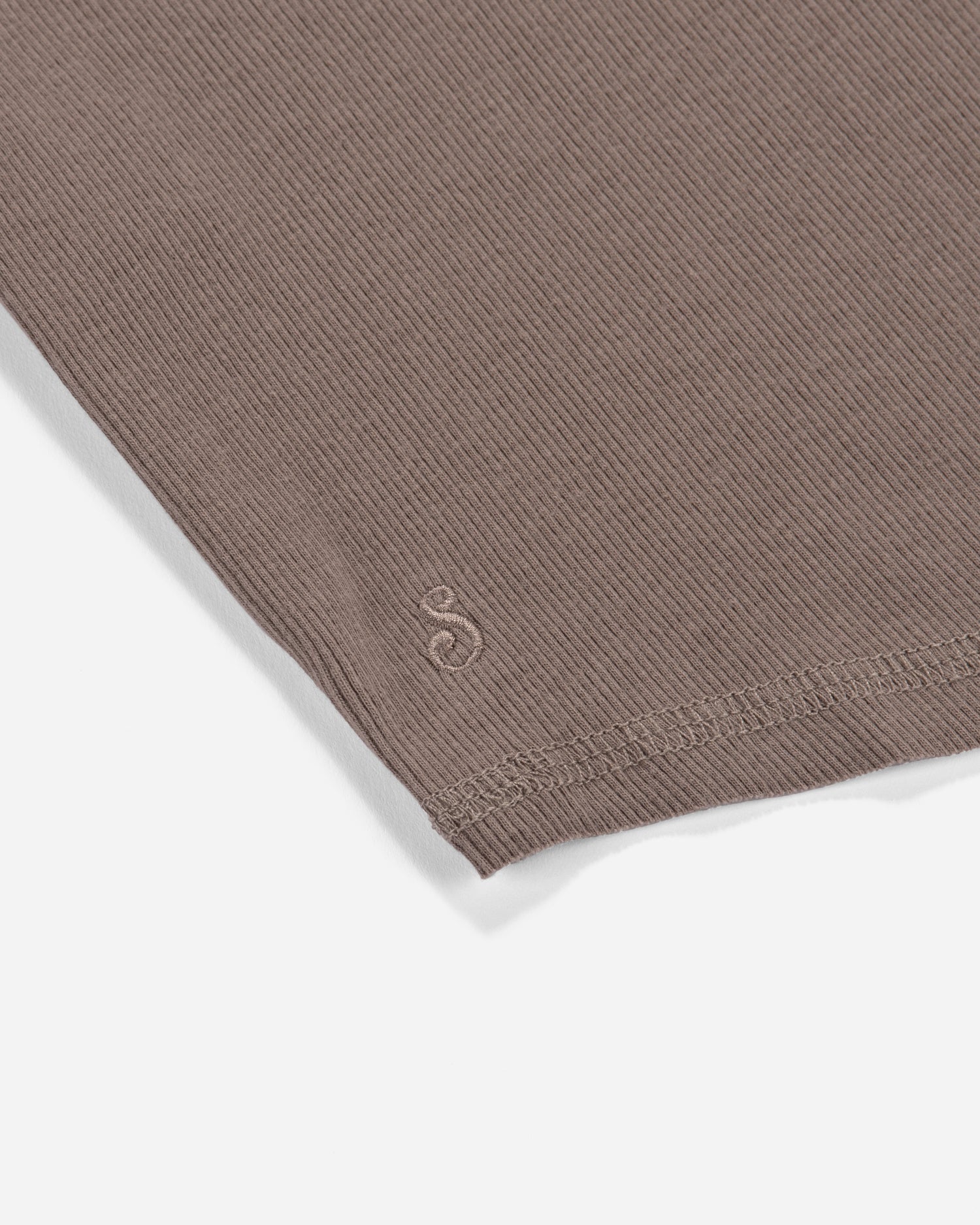 Close up of brown fabric on white background