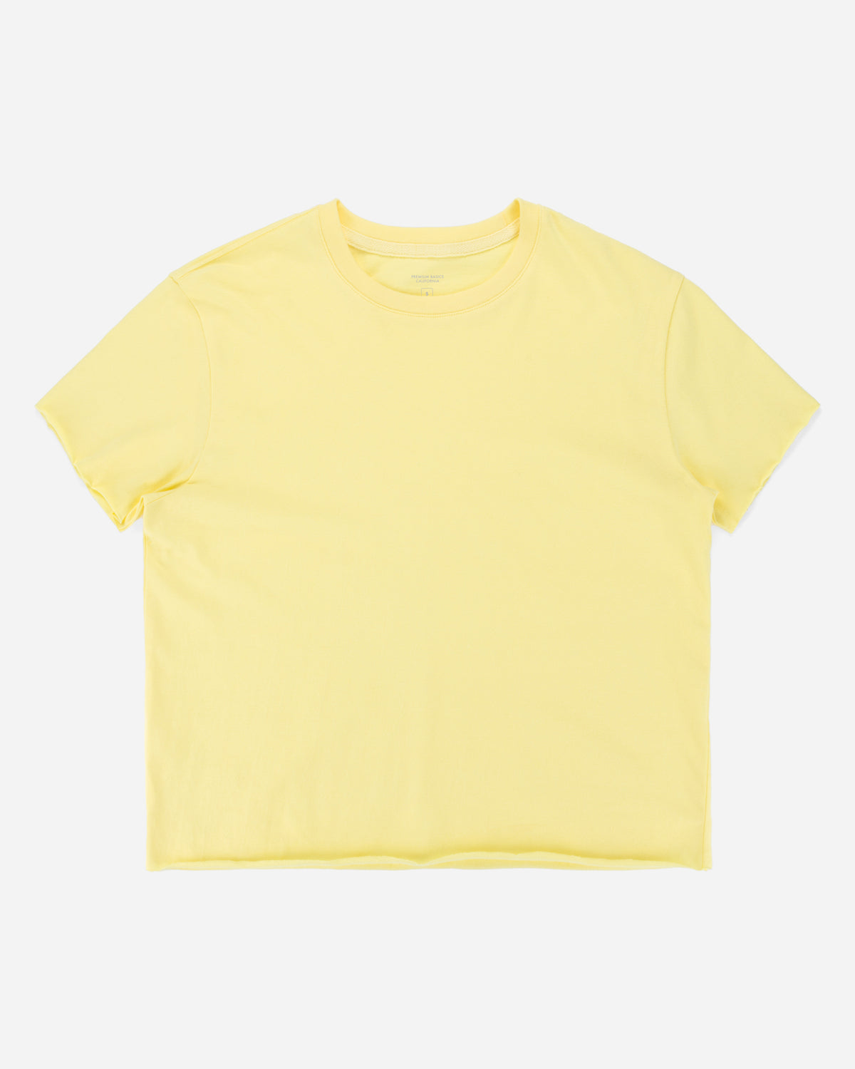 A pale yellow short-sleeve crewneck t-shirt laid flat against a light gray background.
